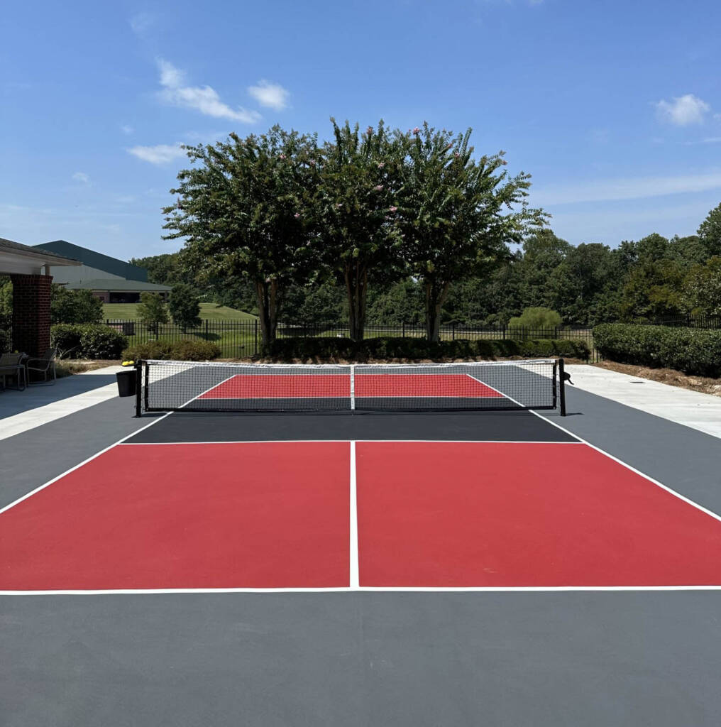 Backyard pickleball court with SnapSports surface and LED lighting in Lubbock, TX