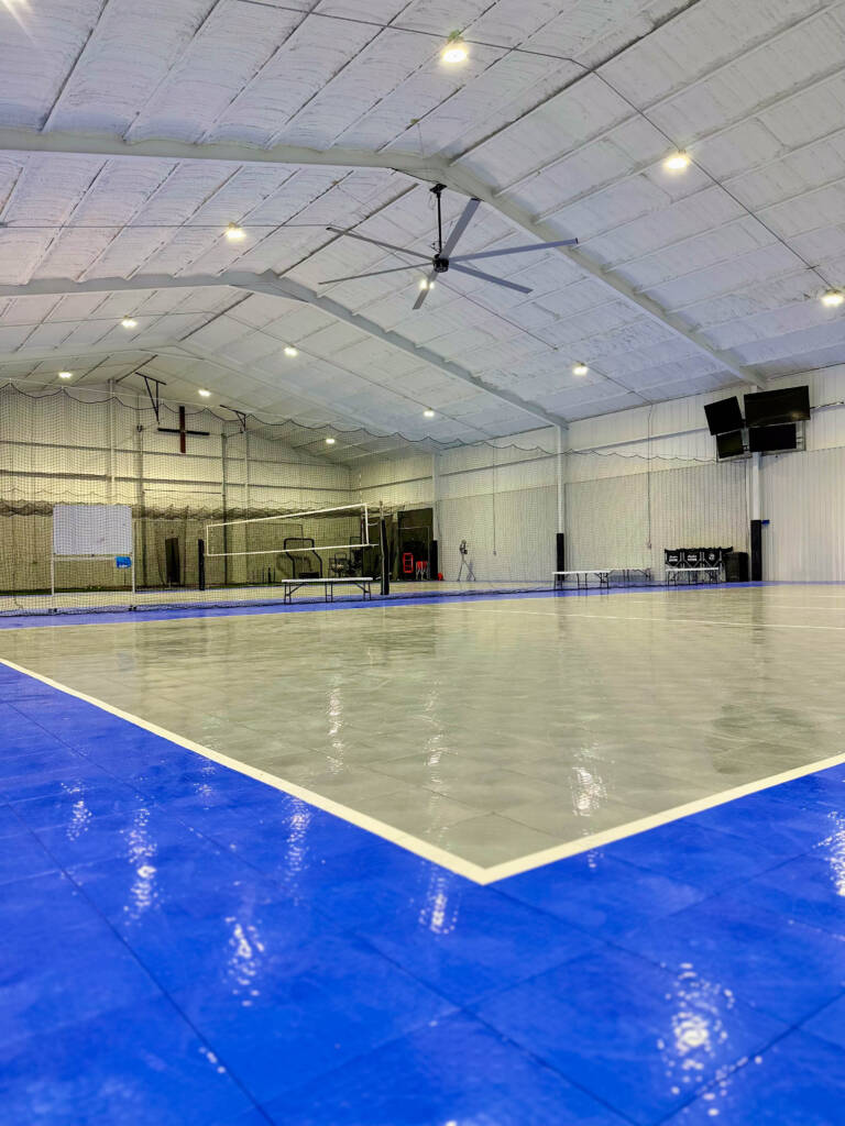 Indoor Multi-sport court with SnapSports modular tiles and turf batting cages in Lubbock, TX
