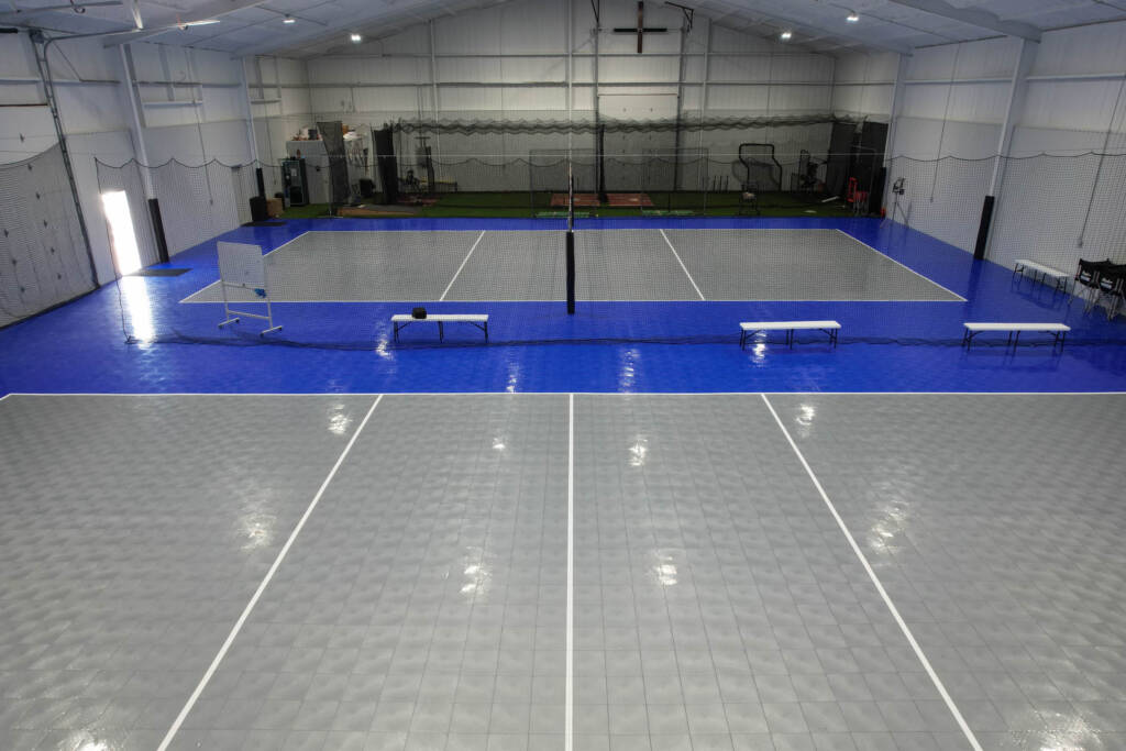 Indoor Multi-sport court with SnapSports modular tiles and turf batting cages in Lubbock, TX