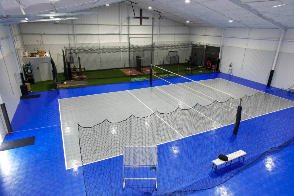 Indoor Multi-sport court with SnapSports modular tiles and turf batting cages in Lubbock, TX